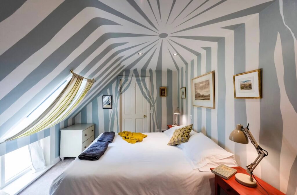 A quirkily decorated double bedroom